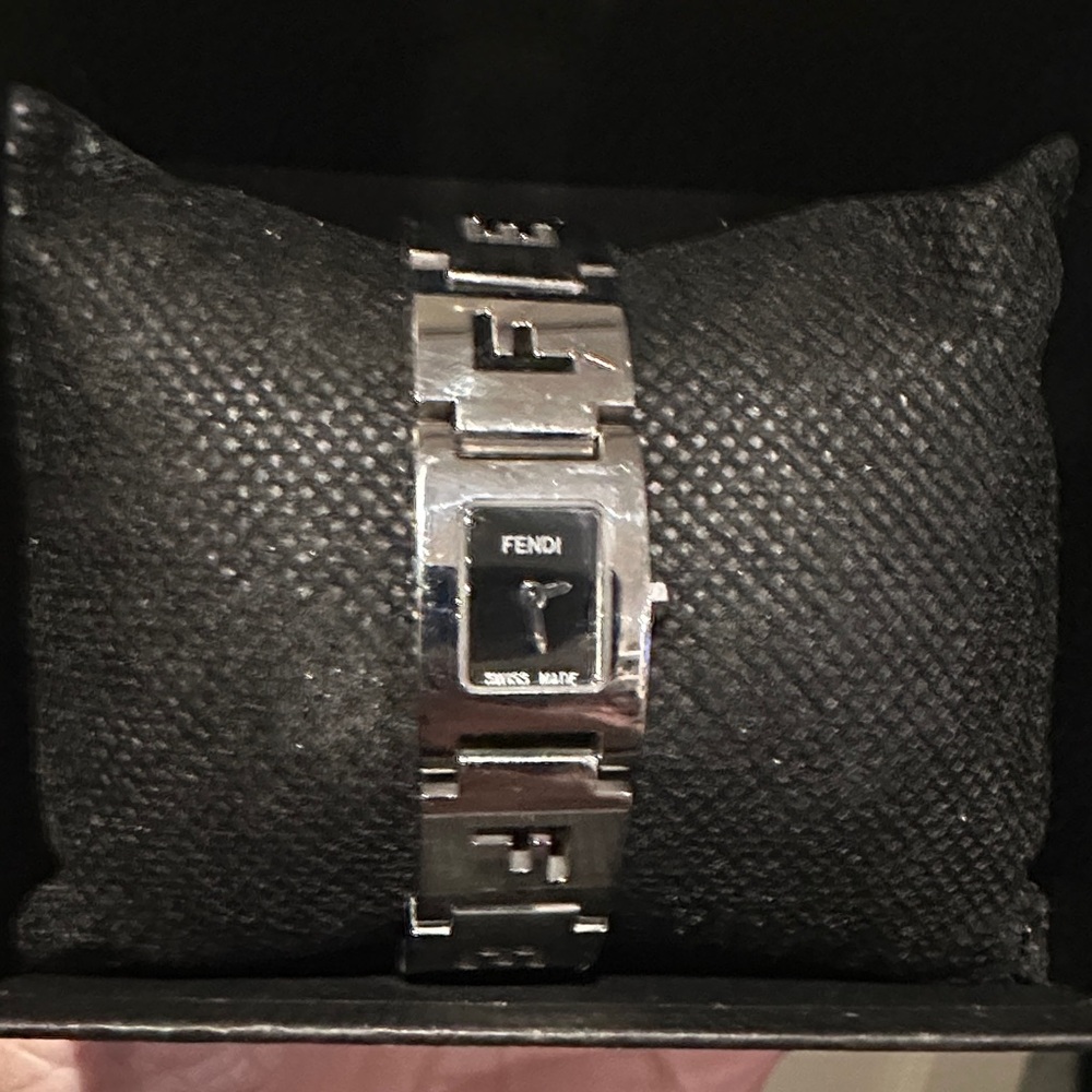 VACATION SALE 50% off till june 30
Fendi Black and Silver bracelet watch